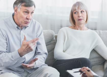 Photo of older white couple in therapy session