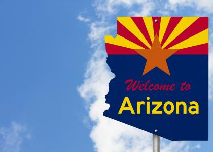 Photo of an Arizona welcome sign against a sky background